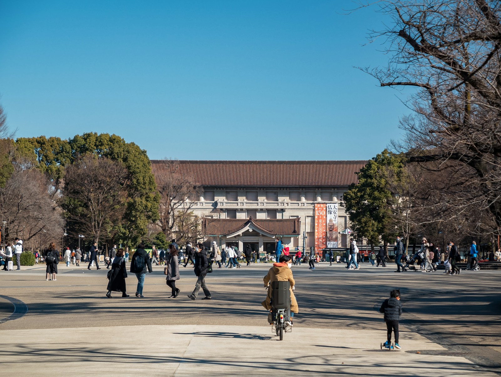 Visitors on a park path, used as general context for planning a flexible Ueno museum day.
