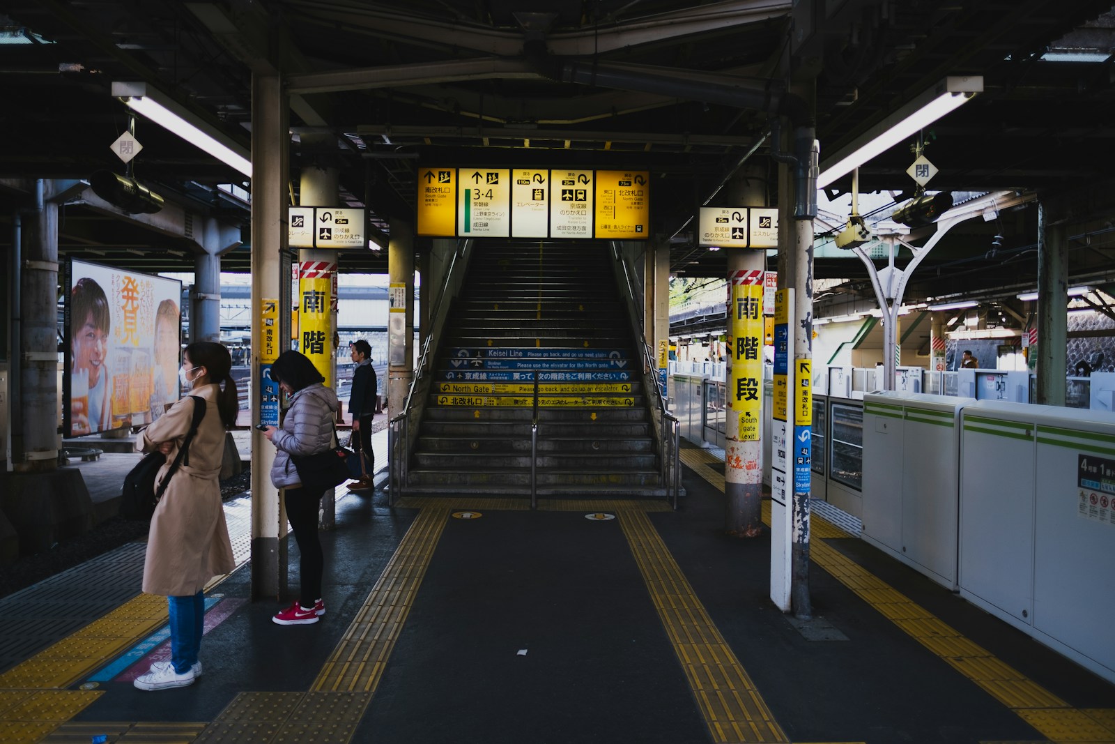 Tokyo urban scene photographed by Levi Meir Clancy; general travel context, not a verified station access route.